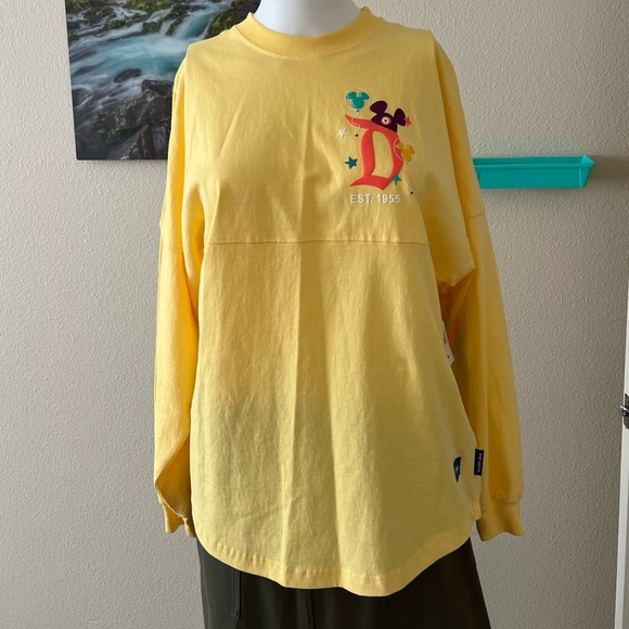 WOMEN'S DISNEY YELLOW DISNEYLAND RESORT LONG SLEEVES SHIRT size XS - Picture 1 of 8